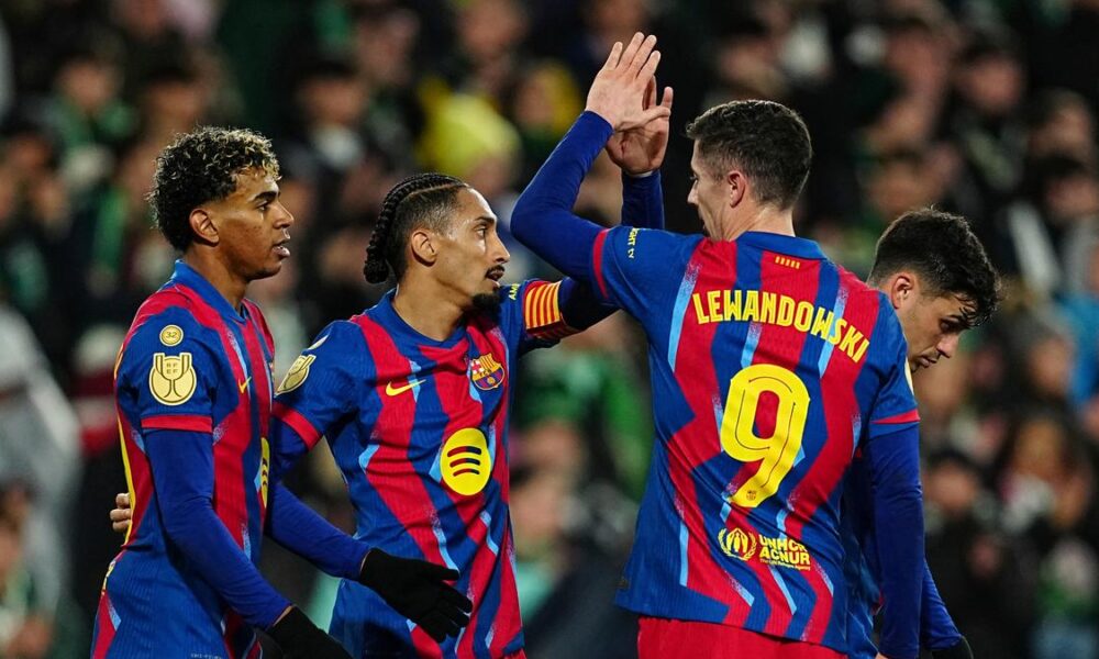 Lamine Yamal, Raphinha and Robert Lewandowski of FC Barcelona celebrating