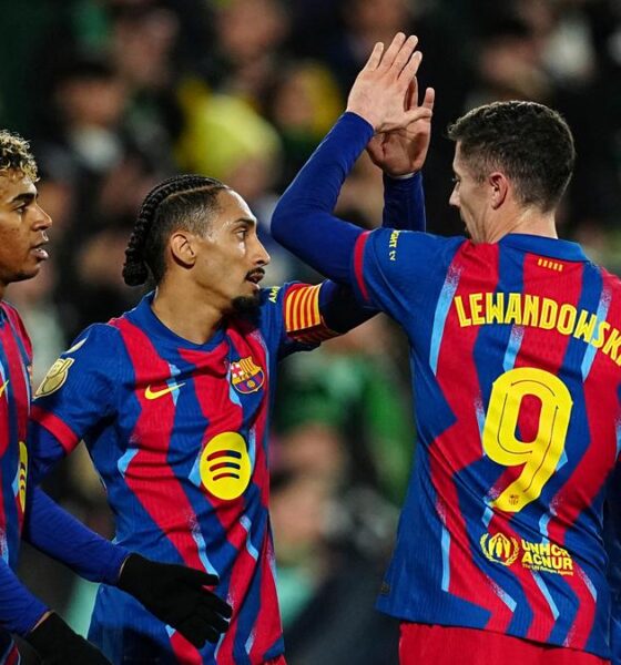 Lamine Yamal, Raphinha and Robert Lewandowski of FC Barcelona celebrating