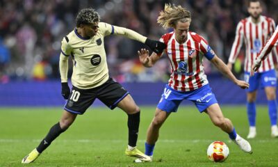 Marcos Llorente of Atletico Madrid against Lamine Yamal of Barcelona at Camp Nou