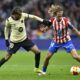 Marcos Llorente of Atletico Madrid against Lamine Yamal of Barcelona at Camp Nou