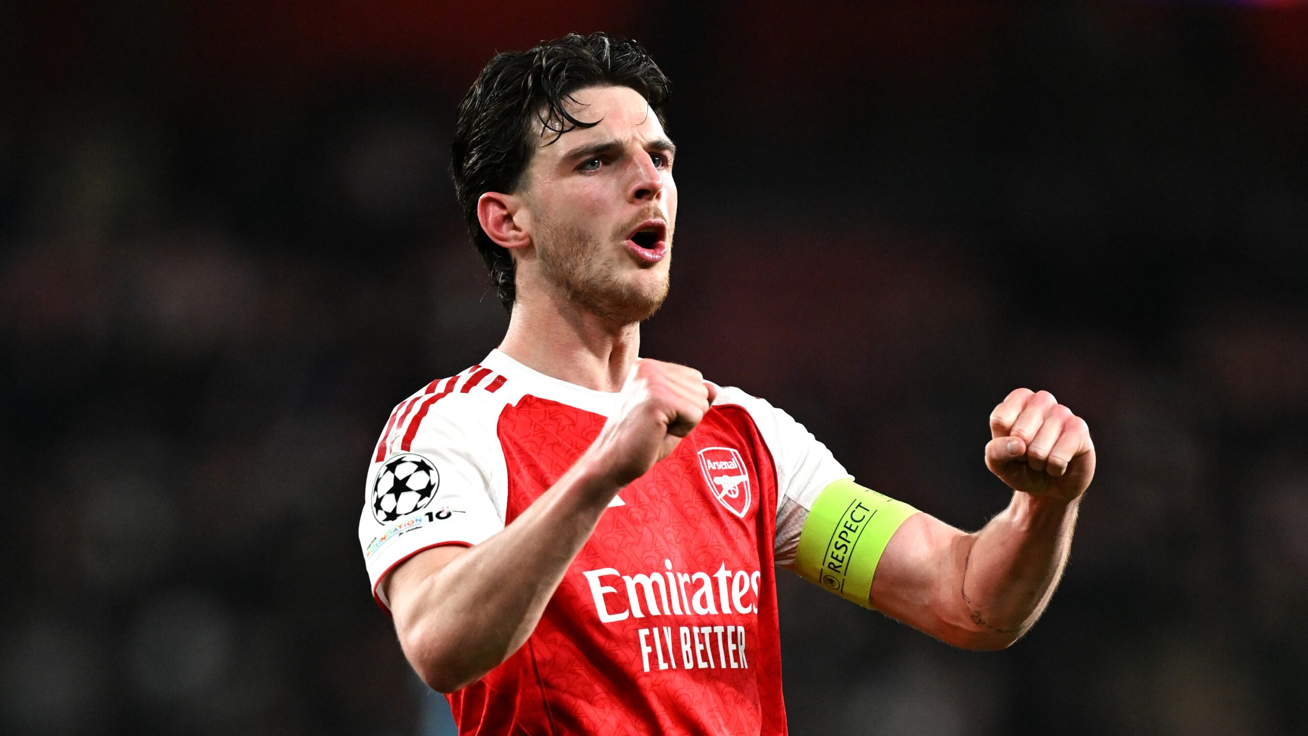 Arsenal midfielder Declan Rice celebrates after Arsenal secured a place in the UEFA Champions League semi-finals following a 1-0 aggregate victory over Sporting Lisbon. Image used for Sportxparte news.