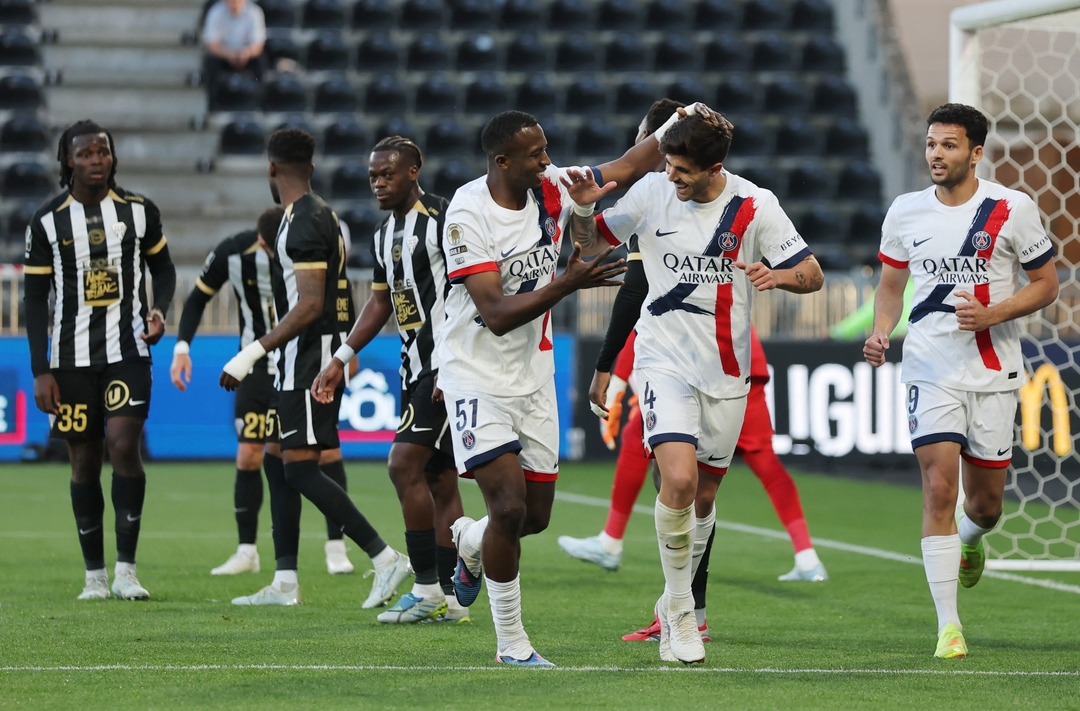 PSG players Willian Pacho (51), Lucas Beraldo (4), and Lucas Hernández celebrate after scoring a goal during their 3-0 victory against Angers SCO at the Stade Raymond Kopa on April 25, 2026. Image used for Sportxparte news roundup.