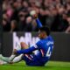 Chelsea forward Estevão is facing a race against time to be fit for the 2026 World Cup after suffering a significant thigh injury during his team’s Premier League defeat to Manchester United. ‎The 19-year-old, considered one of Brazil’s brightest young stars, was forced off after just 16 minutes. ‎ An emotional exit that left him in tears in the dressing room, according to Former Chelsea manager Liam Rosenior. ‎The setback could not have come at a worse moment. Estevão had only recently returned from another muscular issue, and the match against United was just his fourth appearance. ‎Since recovering from a February–March injury that kept him out of Brazil’s high-profile friendlies against France and Croatia. ‎A Serious Blow for Chelsea and Brazil ‎Initial reports from The Athletic indicate that Estevão has sustained a grade four muscle injury. One of the most severe classifications is often associated with a long recovery period. ‎Such an injury could significantly threaten his availability for the World Cup. Brazil coach Carlo Ancelotti already counts on him as a key attacking option. ‎Chelsea has not yet released the official scan results, which were completed last Monday. Until then, the club remains cautious. But early indications suggest it may be weeks if not months before the teenager can return to full fitness. ‎The timing is brutal for the London club, who are preparing for an FA Cup semi-final and pushing to secure a top-six Premier League finish. The Blues currently sit seventh with 48 points, just two behind sixth place. ‎Before the injury, Estevão had contributed eight goals and three assists across 36 appearances in all competitions. An encouraging return during what has been a transitional and injury-disrupted campaign. ‎Can Estevão Make The World Cup? ‎For Brazil, the situation is even more delicate. Estevão has become one of Ancelotti’s most influential performers, earning 11 caps and scoring five goals including four in his last four matches. ‎His explosiveness, one-on-one ability, and direct attacking threat have made him a central figure in Brazil’s tactical plans. ‎However, the calendar is unforgiving. ‎Ancelotti will announce his final World Cup squad on May 18, and Brazil’s opening match against Morocco is set for June 13. ‎That leaves less than eight weeks for the young forward to recover fully, regain fitness, and convince the Seleção staff he is ready for the world’s biggest stage. ‎Medical specialists typically estimate that severe thigh injuries of this grade often require extended rehabilitation. With a cautious return-to-play timeline to avoid recurrence. ‎Given that Estevão has already experienced multiple muscle problems this season, Brazil’s medical team will be especially careful. ‎A Devastating Twist for a Rising Star ‎This World Cup was poised to be Estevão’s global breakthrough moment. His rapid progress with Chelsea, coupled with his electric displays for Brazil, had already sparked excitement about his potential impact at the tournament. ‎Now, his participation is uncertain at best. ‎The coming days will be critical as Chelsea prepares to release their official medical update. Both the club and the Brazilian federation will be hoping for a more optimistic prognosis than early reports suggest. ‎But reality may force Ancelotti into exploring alternative attacking configurations. ‎If Estevão does miss out, it would be one of the most high-profile injury absences heading into the 2026 World Cup. Image is used for Sportxparte news.