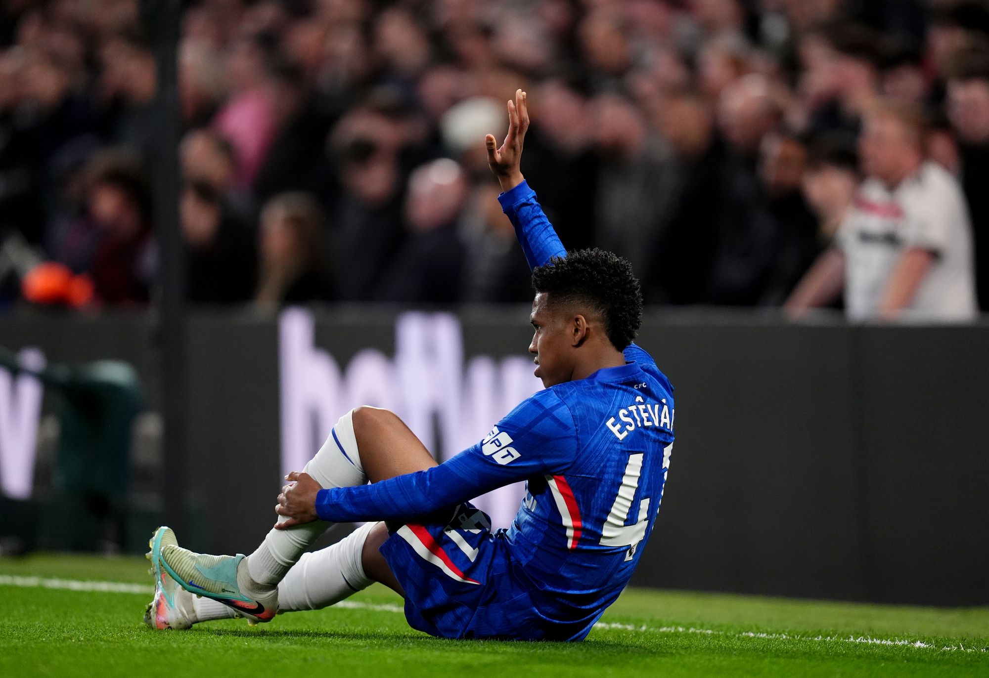 Chelsea forward Estevão is facing a race against time to be fit for the 2026 World Cup after suffering a significant thigh injury during his team’s Premier League defeat to Manchester United. ‎The 19-year-old, considered one of Brazil’s brightest young stars, was forced off after just 16 minutes. ‎ An emotional exit that left him in tears in the dressing room, according to Former Chelsea manager Liam Rosenior. ‎The setback could not have come at a worse moment. Estevão had only recently returned from another muscular issue, and the match against United was just his fourth appearance. ‎Since recovering from a February–March injury that kept him out of Brazil’s high-profile friendlies against France and Croatia. ‎A Serious Blow for Chelsea and Brazil ‎Initial reports from The Athletic indicate that Estevão has sustained a grade four muscle injury. One of the most severe classifications is often associated with a long recovery period. ‎Such an injury could significantly threaten his availability for the World Cup. Brazil coach Carlo Ancelotti already counts on him as a key attacking option. ‎Chelsea has not yet released the official scan results, which were completed last Monday. Until then, the club remains cautious. But early indications suggest it may be weeks if not months before the teenager can return to full fitness. ‎The timing is brutal for the London club, who are preparing for an FA Cup semi-final and pushing to secure a top-six Premier League finish. The Blues currently sit seventh with 48 points, just two behind sixth place. ‎Before the injury, Estevão had contributed eight goals and three assists across 36 appearances in all competitions. An encouraging return during what has been a transitional and injury-disrupted campaign. ‎Can Estevão Make The World Cup? ‎For Brazil, the situation is even more delicate. Estevão has become one of Ancelotti’s most influential performers, earning 11 caps and scoring five goals including four in his last four matches. ‎His explosiveness, one-on-one ability, and direct attacking threat have made him a central figure in Brazil’s tactical plans. ‎However, the calendar is unforgiving. ‎Ancelotti will announce his final World Cup squad on May 18, and Brazil’s opening match against Morocco is set for June 13. ‎That leaves less than eight weeks for the young forward to recover fully, regain fitness, and convince the Seleção staff he is ready for the world’s biggest stage. ‎Medical specialists typically estimate that severe thigh injuries of this grade often require extended rehabilitation. With a cautious return-to-play timeline to avoid recurrence. ‎Given that Estevão has already experienced multiple muscle problems this season, Brazil’s medical team will be especially careful. ‎A Devastating Twist for a Rising Star ‎This World Cup was poised to be Estevão’s global breakthrough moment. His rapid progress with Chelsea, coupled with his electric displays for Brazil, had already sparked excitement about his potential impact at the tournament. ‎Now, his participation is uncertain at best. ‎The coming days will be critical as Chelsea prepares to release their official medical update. Both the club and the Brazilian federation will be hoping for a more optimistic prognosis than early reports suggest. ‎But reality may force Ancelotti into exploring alternative attacking configurations. ‎If Estevão does miss out, it would be one of the most high-profile injury absences heading into the 2026 World Cup. Image is used for Sportxparte news.