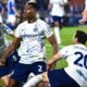 Denzel Dumfries and teammates Hakan Çalhanoğlu and Alessandro Bastoni of Inter Milan celebrate a goal while wearing the 2025/26 white and ghost aqua away kit with the Betsson Sport sponsor. Image used by Sportxparte news