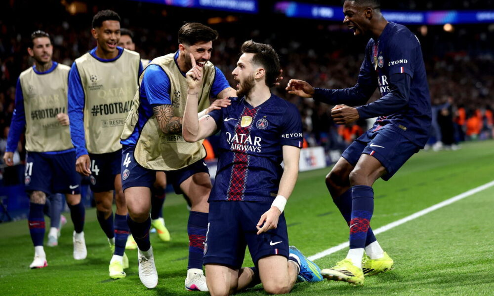 Kvaratskhelia is celebrating his goal in the Champions League quarter-final against Liverpool, which took place just yesterday on April 8, 2026. Image used for Sportxparte News Roundup.