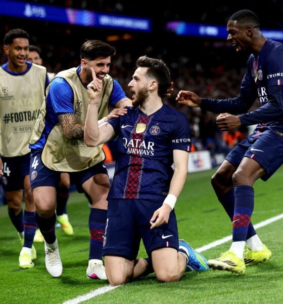 Kvaratskhelia is celebrating his goal in the Champions League quarter-final against Liverpool, which took place just yesterday on April 8, 2026. Image used for Sportxparte News Roundup.