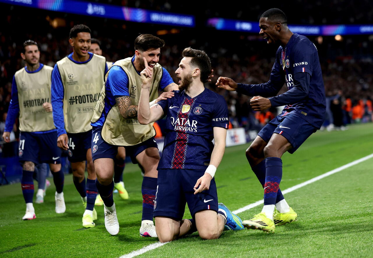 Kvaratskhelia is celebrating his goal in the Champions League quarter-final against Liverpool, which took place just yesterday on April 8, 2026. Image used for Sportxparte News Roundup.