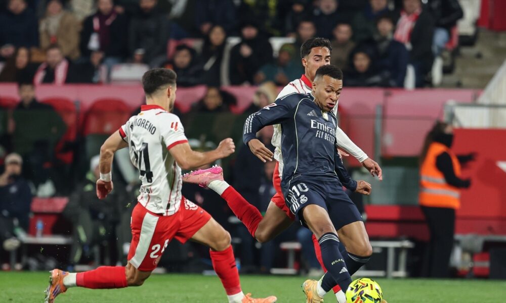 This image captures a LaLiga match between Real Madrid and Girona FC, featuring forward Kylian Mbappé in action. Image used for Sportxparte news.