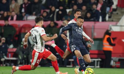 This image captures a LaLiga match between Real Madrid and Girona FC, featuring forward Kylian Mbappé in action. Image used for Sportxparte news.