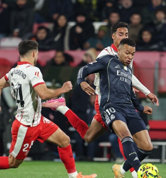 This image captures a LaLiga match between Real Madrid and Girona FC, featuring forward Kylian Mbappé in action. Image used for Sportxparte news.