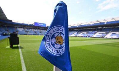 This image shows a corner flag featuring the logo of the Leicester City Football Club at their home stadium, the King Power Stadium. Image used for Sportxparte News