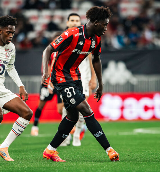 Portuguese defender Tiago Santos of Lille OSC (left, in white) and midfielder Reda Belahyane of OGC Nice (right, in red and black) competing for the ball during a Ligue 1 fixture. Image used for Sportxparte news.