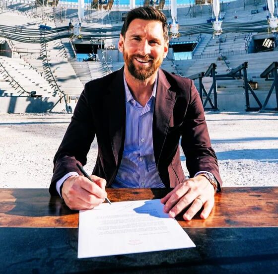 Lionel Messi is signing a new contract with the contract in front of him inside Inter Miami New stadium. Image used for Sportxparte news.
