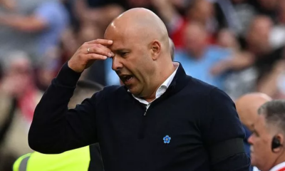 Liverpool Manager Arne Slot is holding his head after a defeat.