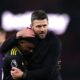 This photo captures a moment between Manchester United coach Michael Carrick and player Amad Diallo following a match. Photo used in sportxparte news coverage.