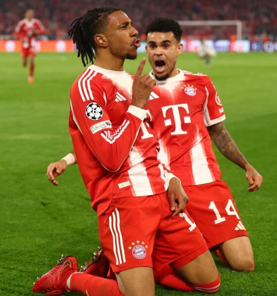 This image captures Michael Olise and Luis Díaz celebrating a late goal during the UEFA Champions League quarter-final second leg between Bayern Munich and Real Madrid on April 15, 2026. Image used for Sportxparte news.