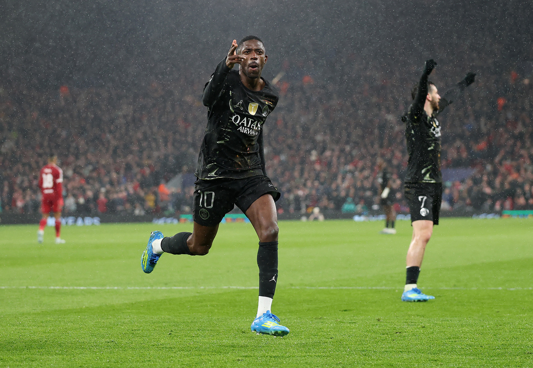 Ousmane Dembélé celebrates scoring for PSG against Liverpool in the 2026 Champions League quarter-final at Anfield. Image used for Sportxparte news.