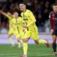 Georges Mikautadze is celebrating a goal for Villarreal CF. He is wearing a bright yellow kit and is captured mid-run with a joyful expression and clenched fists. In the background, teammates in yellow and an opposing player in a navy and maroon kit look on. Image used for Sportxparte Preview.