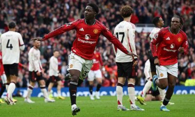 Kobbie Mainoo of Manchester United celebrates a decisive goal during a 3-2 victory over rivals Liverpool on May 3, 2026. This win at Old Trafford officially secured Manchester United’s qualification for the Champions League for the following season. Image used for Sportxparte news Roundup.