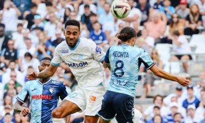 Ligue 1 match between Olympique de Marseille and Le Havre AC, where Marseille's forward Pierre-Emerick Aubameyang and Le Havre's midfielder Yassine Kechta are competing for a header. Image used for Sportxparte news.
