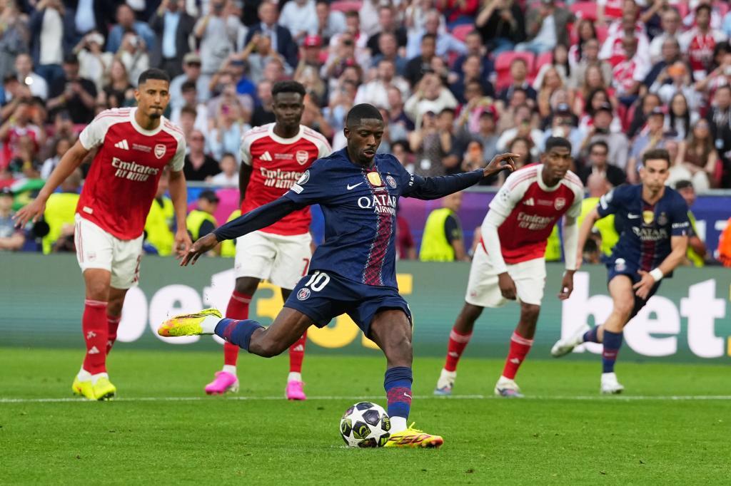 Paris Saint-Germain forward Ousmane Dembélé is taking the crucial 65th-minute penalty kick against Arsenal during the 2025/26 UEFA Champions League final. The match took place at the Puskás Aréna in Budapest, Hungary. Image used for Sportxparte news.