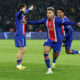 Paris Saint-Germain (PSG) players, including Désiré Doué (centered, arms outstretched) and Ousmane Dembélé (left, in foreground), celebrate a decisive goal during a Ligue 1 match against Stade Brestois 29 on May 10, 2026. Image used for Sportxparte news roundup.
