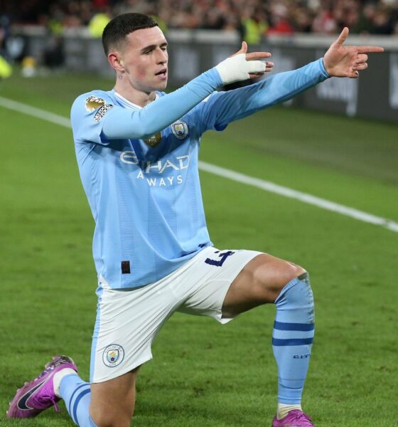 Manchester City's Phil Foden performing his signature "sniper" celebration after scoring during a match against Brentford FC on February 5, 2024. In that specific game, Foden scored a brilliant hat-trick to lead his team to a 3-1 comeback victory. Image used for Sportxparte news.