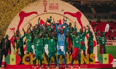 The Senegal national football team is celebrating after initially winning the 2025 Africa Cup of Nations final against host nation Morocco on January 18, 2026. Image used for Sportxparte news.
