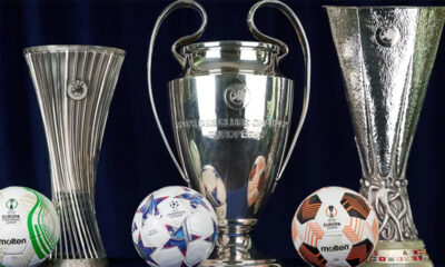 The trophies in the image are for the three major men's European club football competitions organized by UEFA: the UEFA Europa Conference League (left), the UEFA Champions League (center), and the UEFA Europa League (right). Image used for Sportxparte news.
