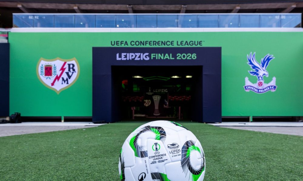 The official tunnel setup and match ball at the Red Bull Arena in Leipzig, Germany, are prepared for the upcoming 2026 UEFA Conference League final. The final features English club Crystal Palace F.C. and Spanish club Rayo Vallecano, with both teams making their first-ever appearance in a major European final. Image used for Sportxparte news.