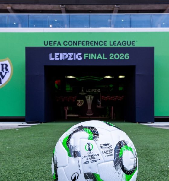 The official tunnel setup and match ball at the Red Bull Arena in Leipzig, Germany, are prepared for the upcoming 2026 UEFA Conference League final. The final features English club Crystal Palace F.C. and Spanish club Rayo Vallecano, with both teams making their first-ever appearance in a major European final. Image used for Sportxparte news.