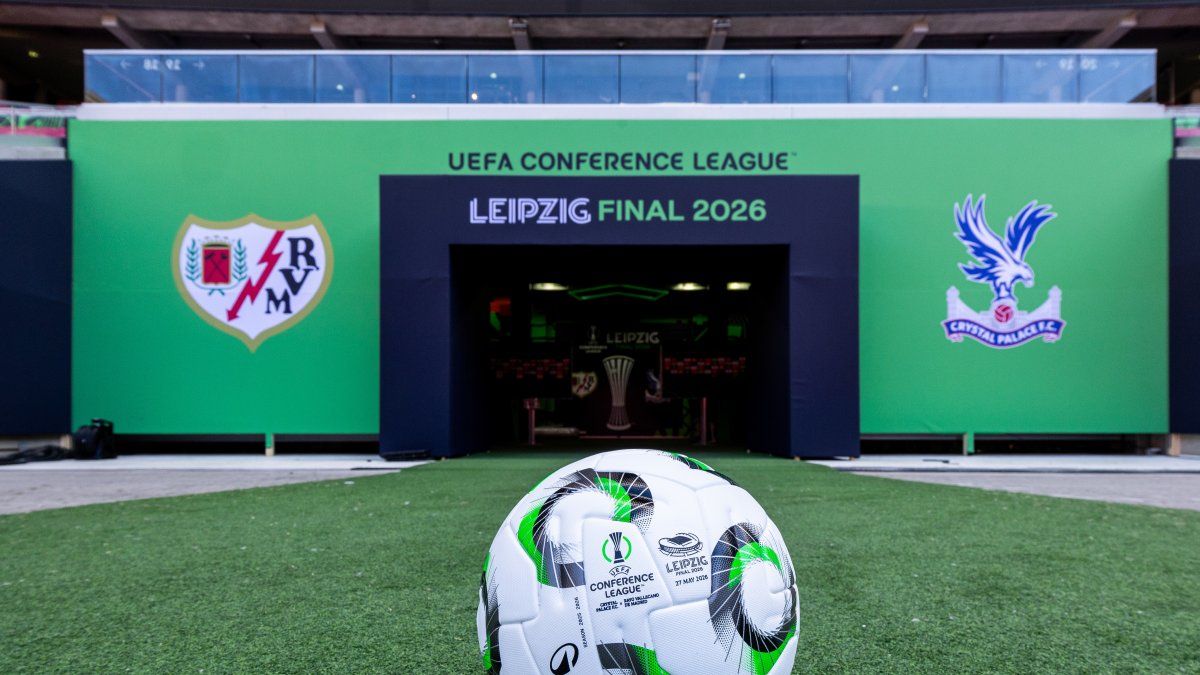 The official tunnel setup and match ball at the Red Bull Arena in Leipzig, Germany, are prepared for the upcoming 2026 UEFA Conference League final. The final features English club Crystal Palace F.C. and Spanish club Rayo Vallecano, with both teams making their first-ever appearance in a major European final. Image used for Sportxparte news.