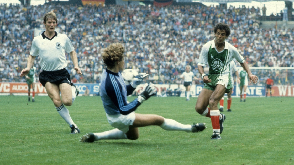 Algeria's historic 2-1 upset against West Germany during the group stage of the 1982 FIFA World Cup. The monumental match took place on June 16, 1982, at the El Molinón stadium in Gijón, Spain. Image used for Sportxparte news.