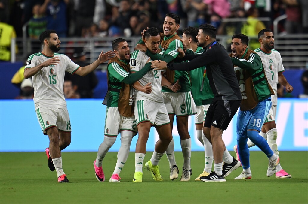 Algeria national football team players, including forward Nadhir Benbouali, celebrate a goal against Jordan during a 2026 FIFA World Cup group stage match at Levi's Stadium. Image used for Sportxparte news.