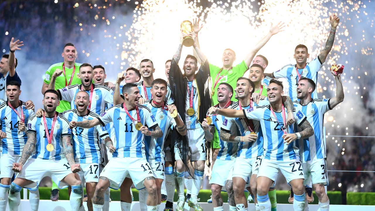 Argentina national football team celebrating their victory at the 2022 FIFA World Cup, where captain Lionel Messi lifted the iconic trophy after defeating France in a dramatic penalty shootout at the Lusail Stadium in Qatar. Image used for Sportxparte news.