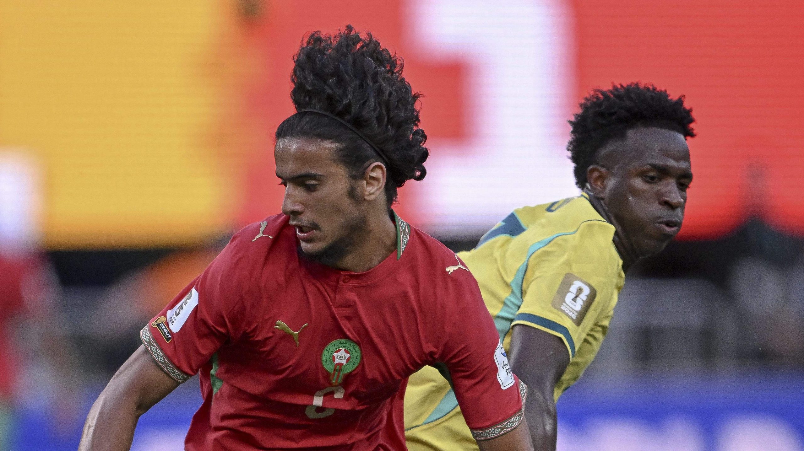 Moroccan midfielder Ayyoub Bouaddi (left) is competing alongside Brazilian forward Vinícius Júnior (right). Image used for Sportxparte news.