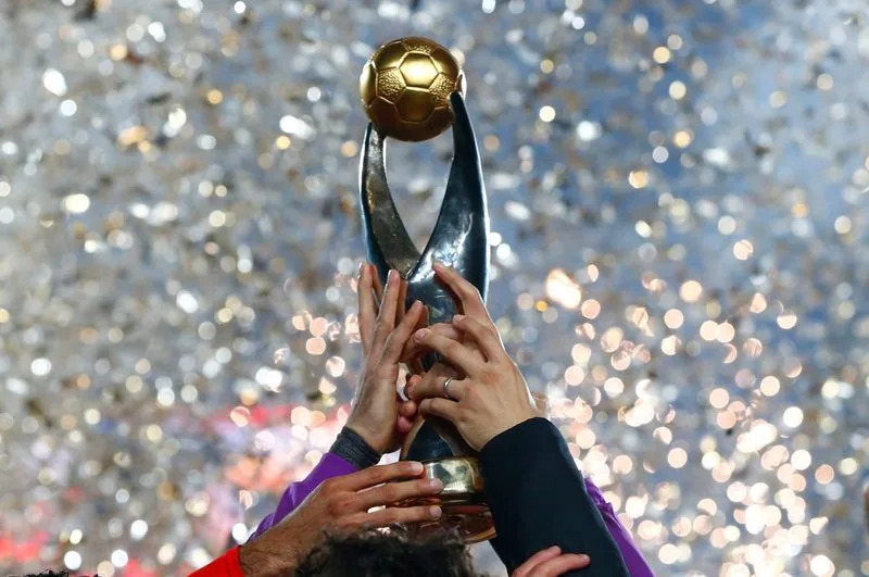 TotalEnergies CAF Champions League trophy, which is awarded to the top club football team in Africa. Image used for Sportxparte news.