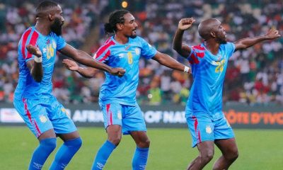 The Democratic Republic of the Congo (DR Congo) national football team is celebrating during their match at the 2023 Africa Cup of Nations (AFCON). Specifically, the players are celebrating a goal during their 3-1 quarter-final victory against Guinea on February 2, 2024. Image used for Sportxparte news.