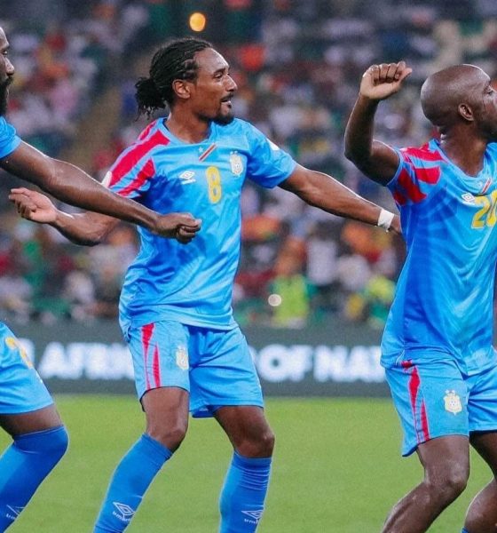 The Democratic Republic of the Congo (DR Congo) national football team is celebrating during their match at the 2023 Africa Cup of Nations (AFCON). Specifically, the players are celebrating a goal during their 3-1 quarter-final victory against Guinea on February 2, 2024. Image used for Sportxparte news.