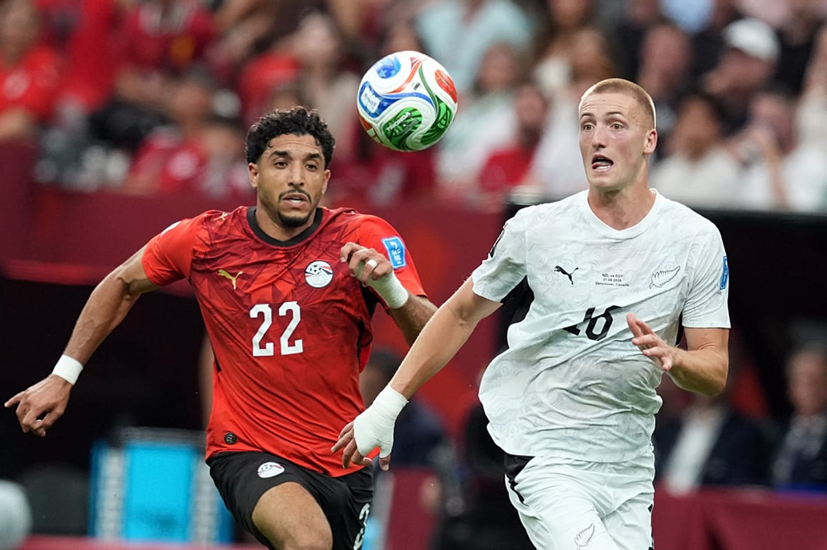 Egypt's Omar Marmoush (wearing jersey number 22) is competing for the ball against New Zealand's Finn Surman during a FIFA World Cup 2026 Group G match held in Vancouver, Canada. Image used for Sportxparte news.