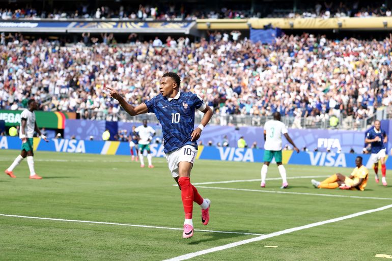 France captain Kylian Mbappé is celebrating his historic opening goal during France's 3-1 victory against Senegal in their opening Group I match of the 2026 FIFA World Cup. Image used for Sportxparte news.