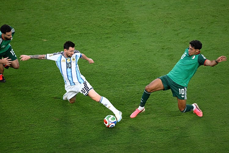 Lionel Messi driving the ball forward for Argentina during their 2026 FIFA World Cup opener against Algeria, which took place on June 16, 2026. Image used for Sportxparte news.