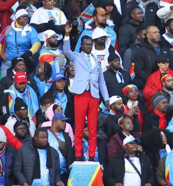 Michel Nkuka Mboladinga or "Lumumba Vea," became famous for standing motionless during DR Congo matches to honor the country's first leader, Patrice Lumumba. Image used for Sportxparte news.