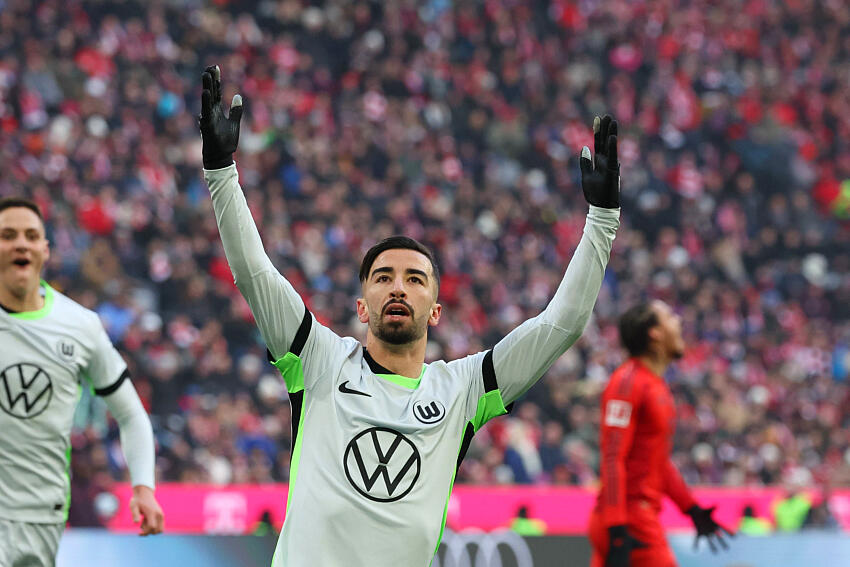 Algerian professional footballer Mohamed Amoura is celebrating during a match for German Bundesliga club VfL Wolfsburg. Image used for Sportxparte news.