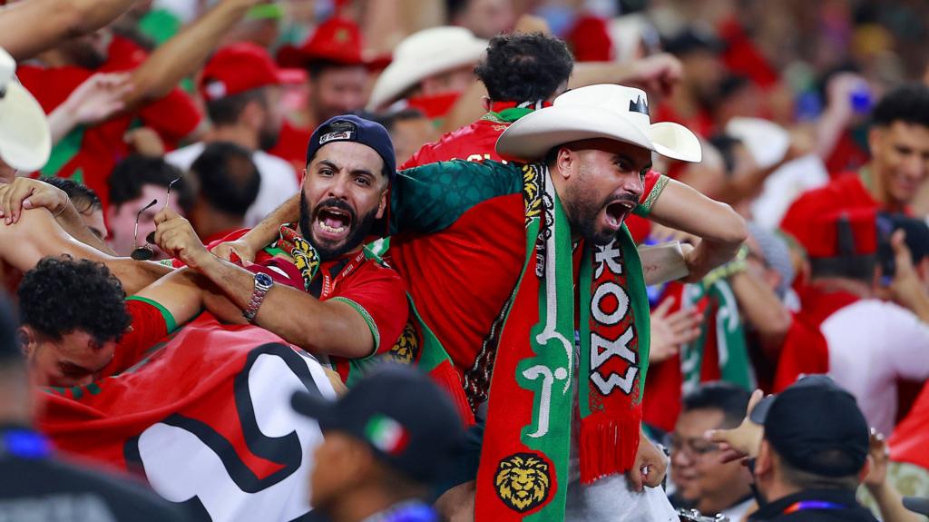 Passionate fans cheering for the Moroccan national team during their round of 32 match against the Netherlands at the 2026 World Cup in Monterrey, Mexico. Image used for Sportxparte news.
