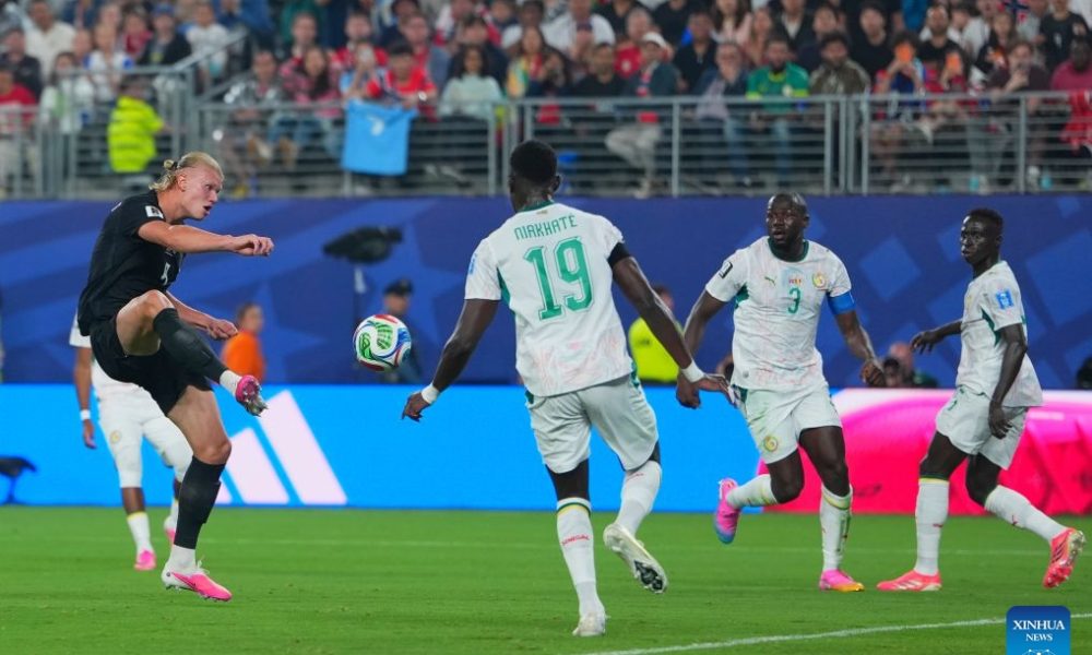 Norway’s Erling Haaland shoots and scores a goal past Senegal defenders Moussa Niakhaté and Kalidou Koulibaly during a 2026 World Cup Group I match. Image used for Sportxparte news.