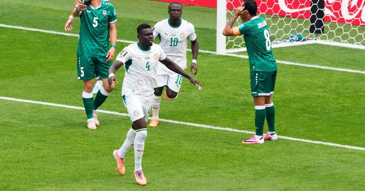 Senegal national football team players, including Abdoulaye Seck wearing number 4, and Sadio Mané wearing number 10, celebrate a goal against Iraq at Toronto Stadium during the 2026 FIFA World Cup. Image used for Sportxparte news.