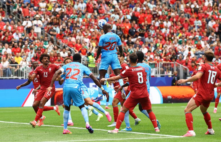 Historic sporting milestone as Yoane Wissa (#20) heads home the equalizer for DR Congo against Portugal. The goal occurred during first-half stoppage time of their Group K opening match at the 2026 FIFA World Cup in Houston, Texas. Image used for Sportxparte news.