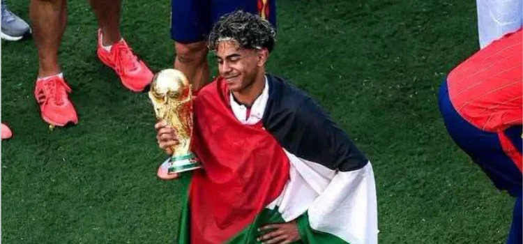 Spanish footballer Lamine Yamal celebrating with a Palestinian flag draped over his shoulders is completely altered and fabricated. Image used for Sportxparte news.